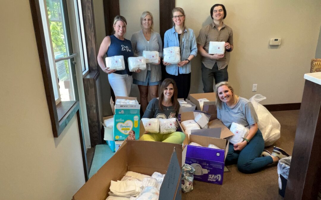 Asheville Periodontics Volunteers with Babies Need Bottoms